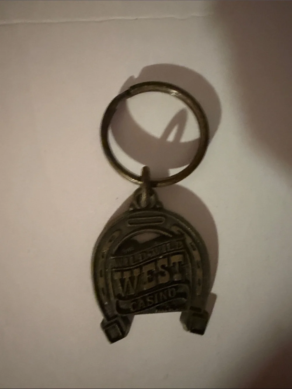Wild Wild West Casino Las Vegas NV Horseshoe Metal Keychain Vintage Souvenir